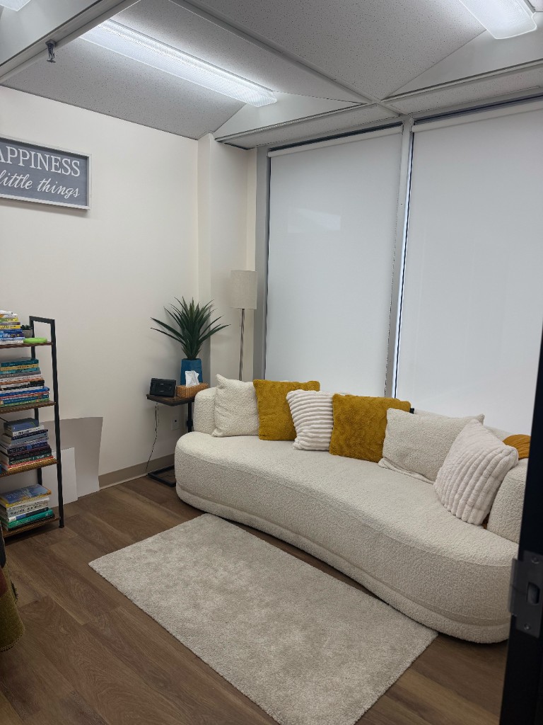 A second therapy room with comfortable lounge seating