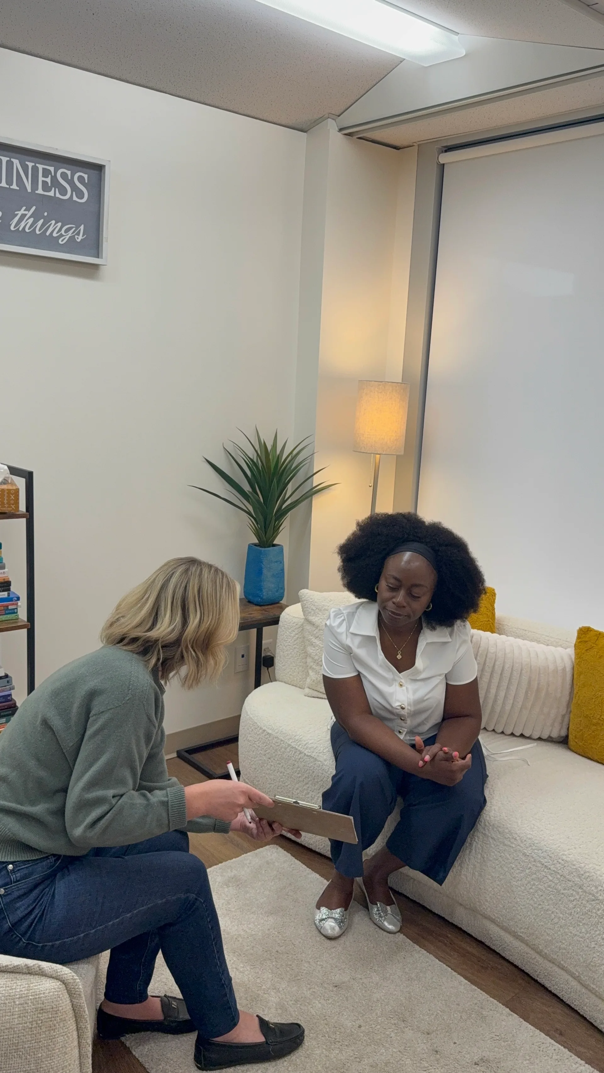 A warm therapy conversation in the Healing Journey Collective Calgary office
